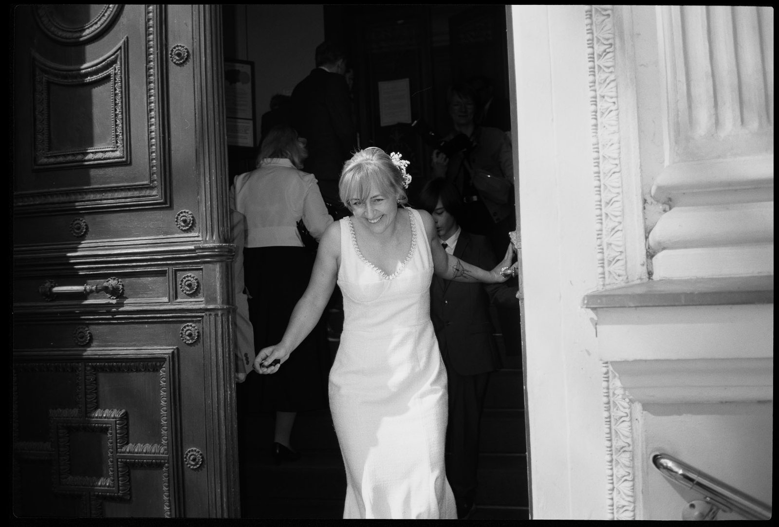 The bride in a doorway, in black and white