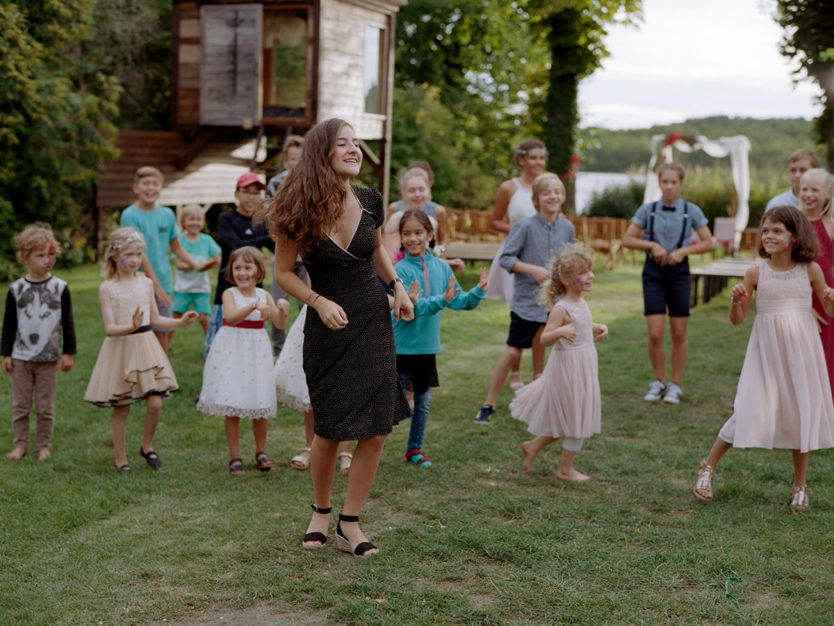 Children playing on the lawn during the celebration