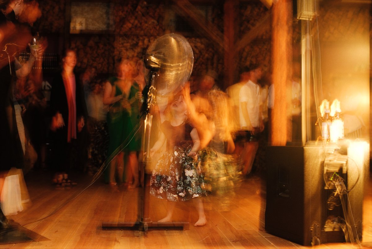 Dancing in candlelight, a long-exposure film frame