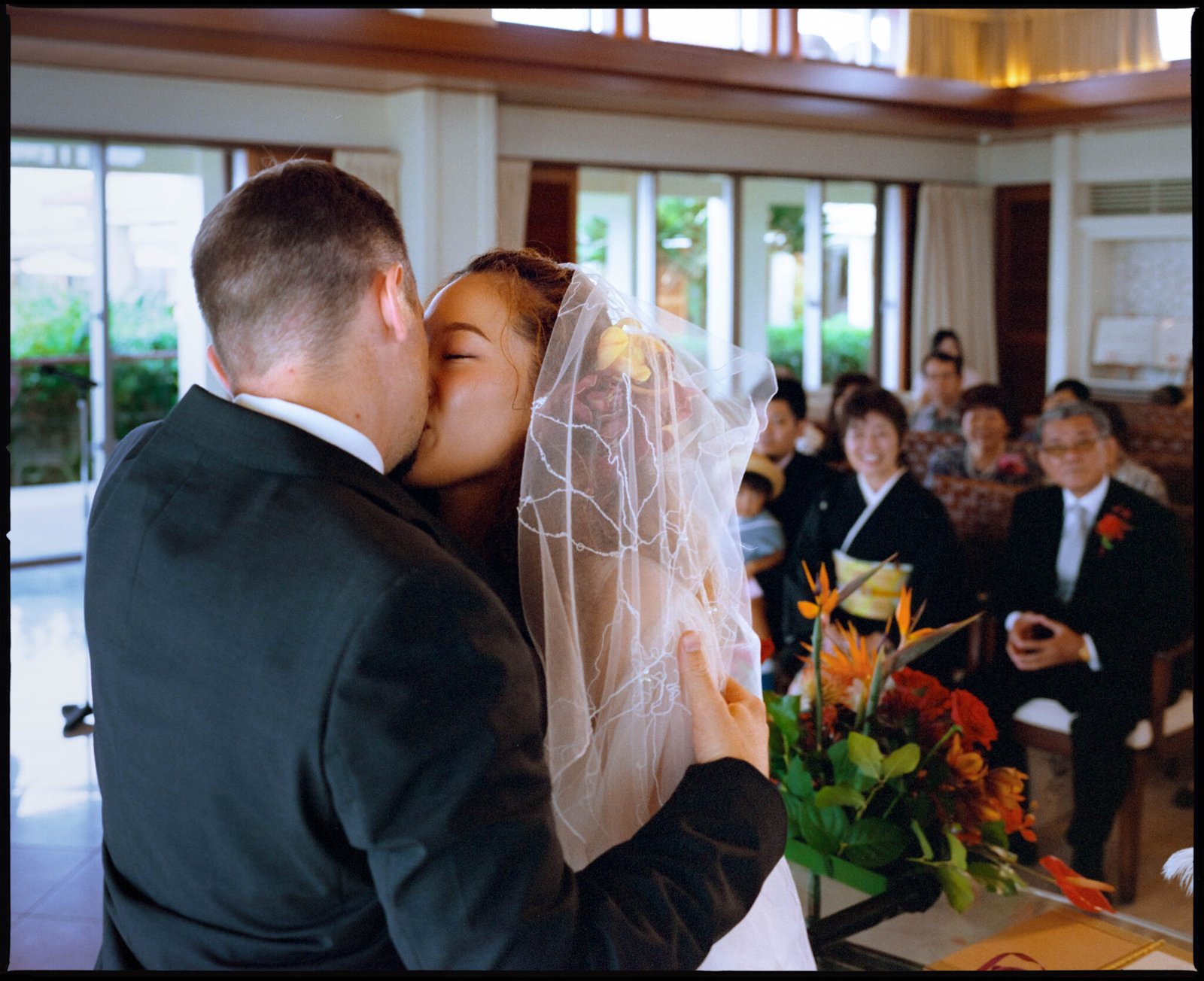 The couple embracing at the ceremony
