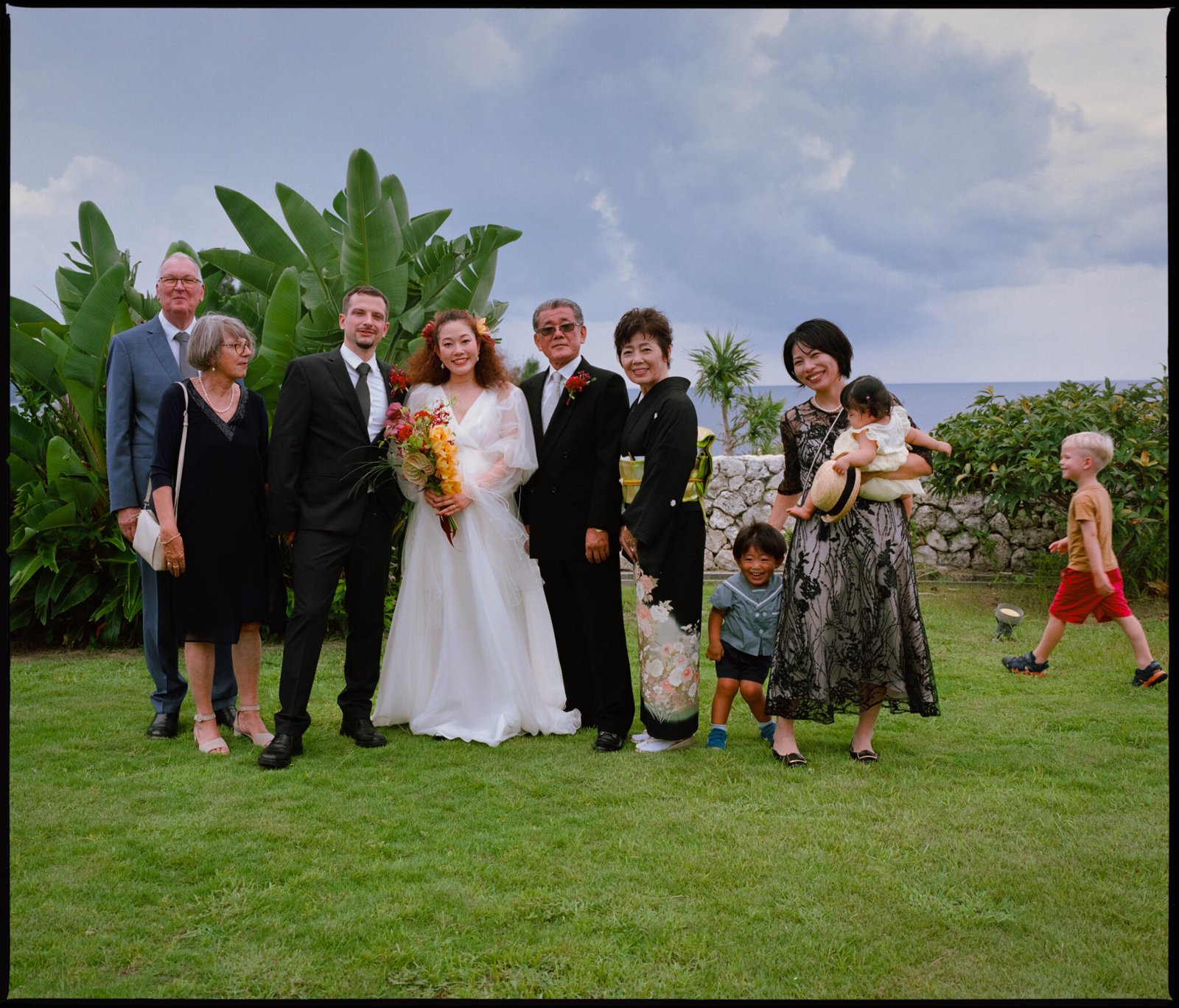 A family group portrait outdoors