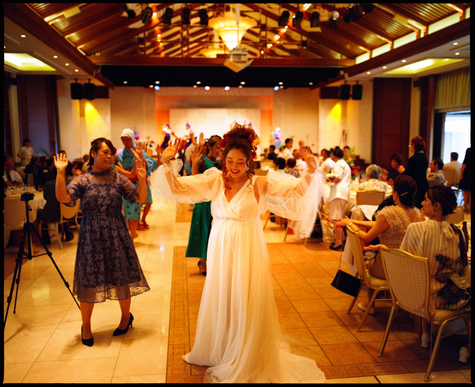 Guests dancing together in the hall